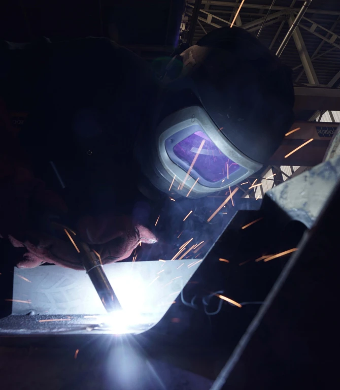A RBSL employee welding